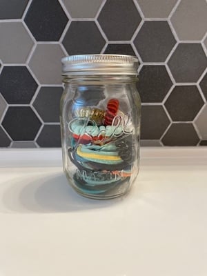 jar with hair ties