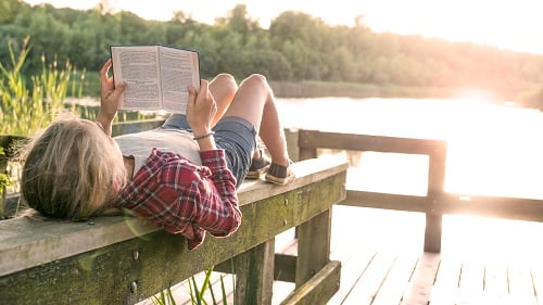 Girl reading outside