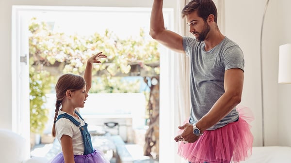 Dad and daughter doing ballet